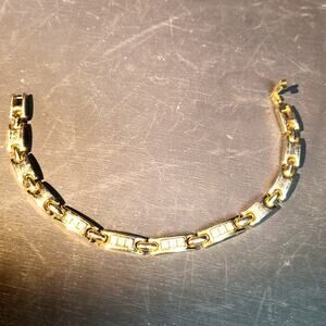 1115.  Gold Tone Bracelet with Rhinestones